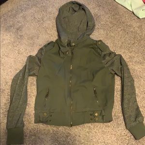 Hunter green jacket with grey sleeves and hood